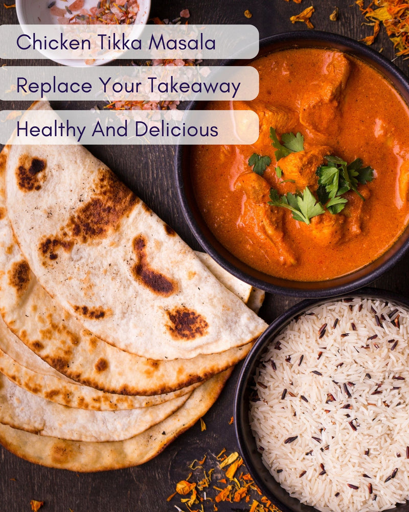 picture of chicken tikka masala with naan bread and rice